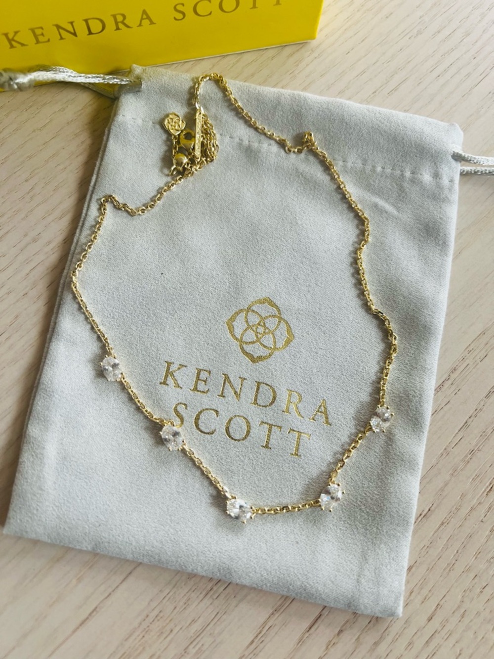 Kendra Scott necklace.